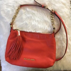 Michael Kors orange crossbody bag